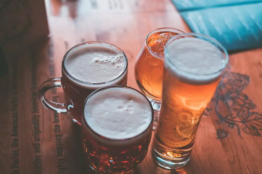 Image of four clear glass with beer