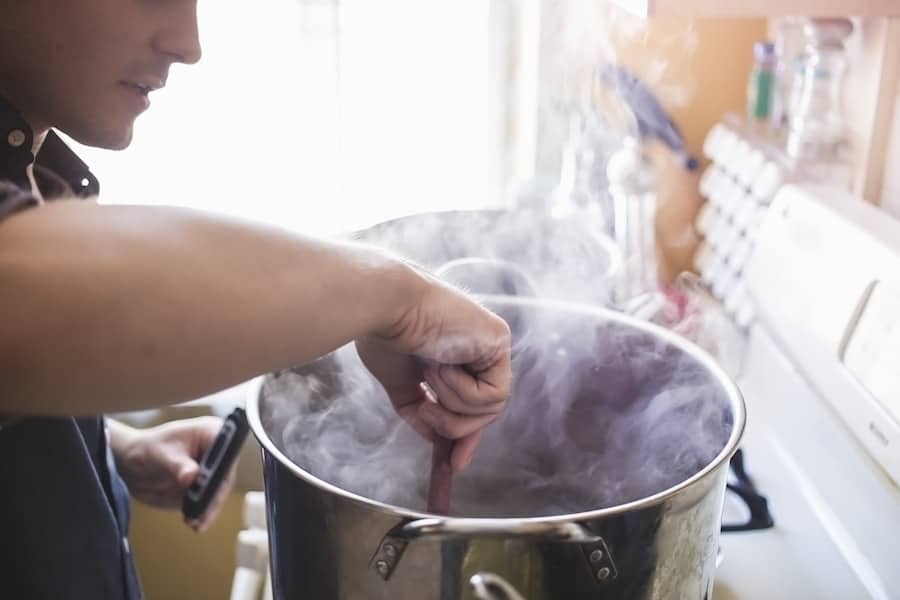 An image of a person brewing beer