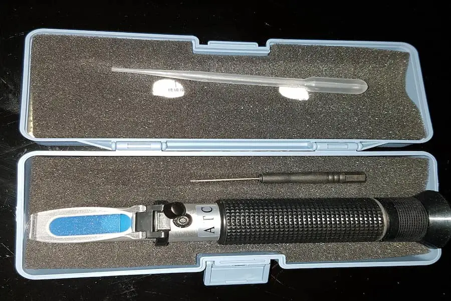 An image of a refractometer in a case