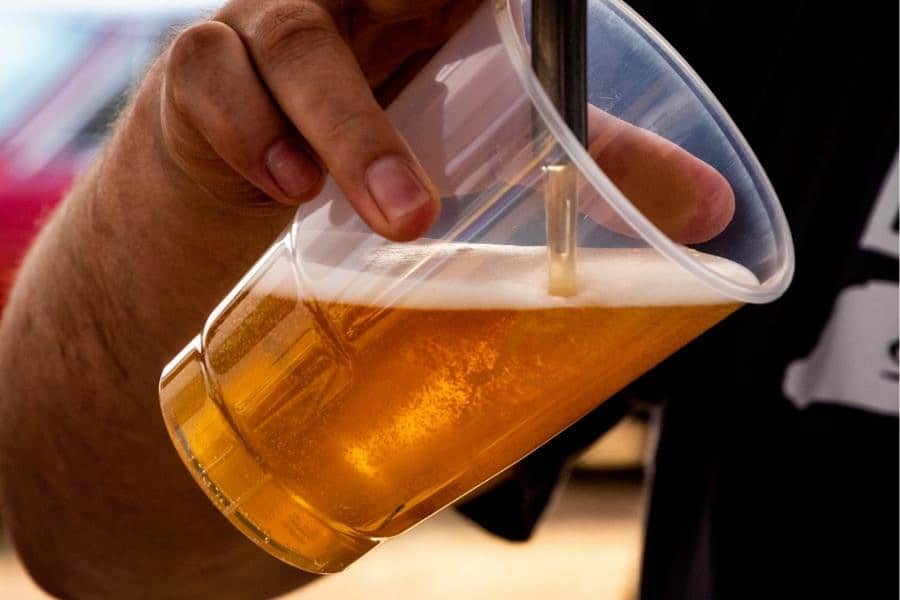 An image of cup filling beer