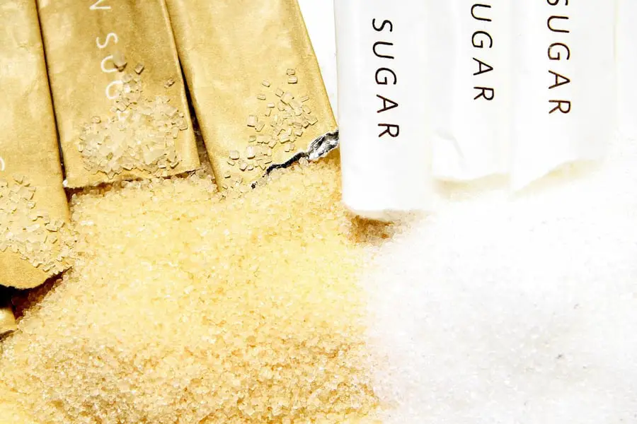 An image of brown and white sugar