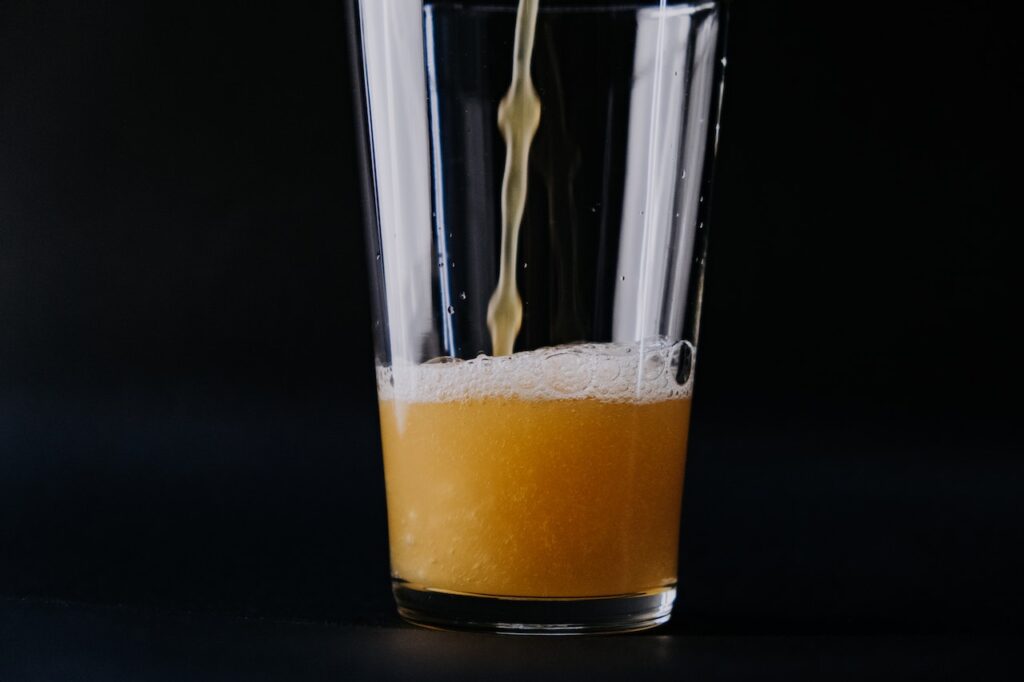 An image of pouring liquid in a glass